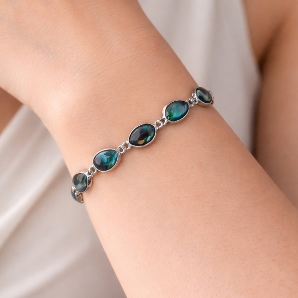 Source Unknown Jewelry - Silver link bracelet with teardrop-shaped abalone.